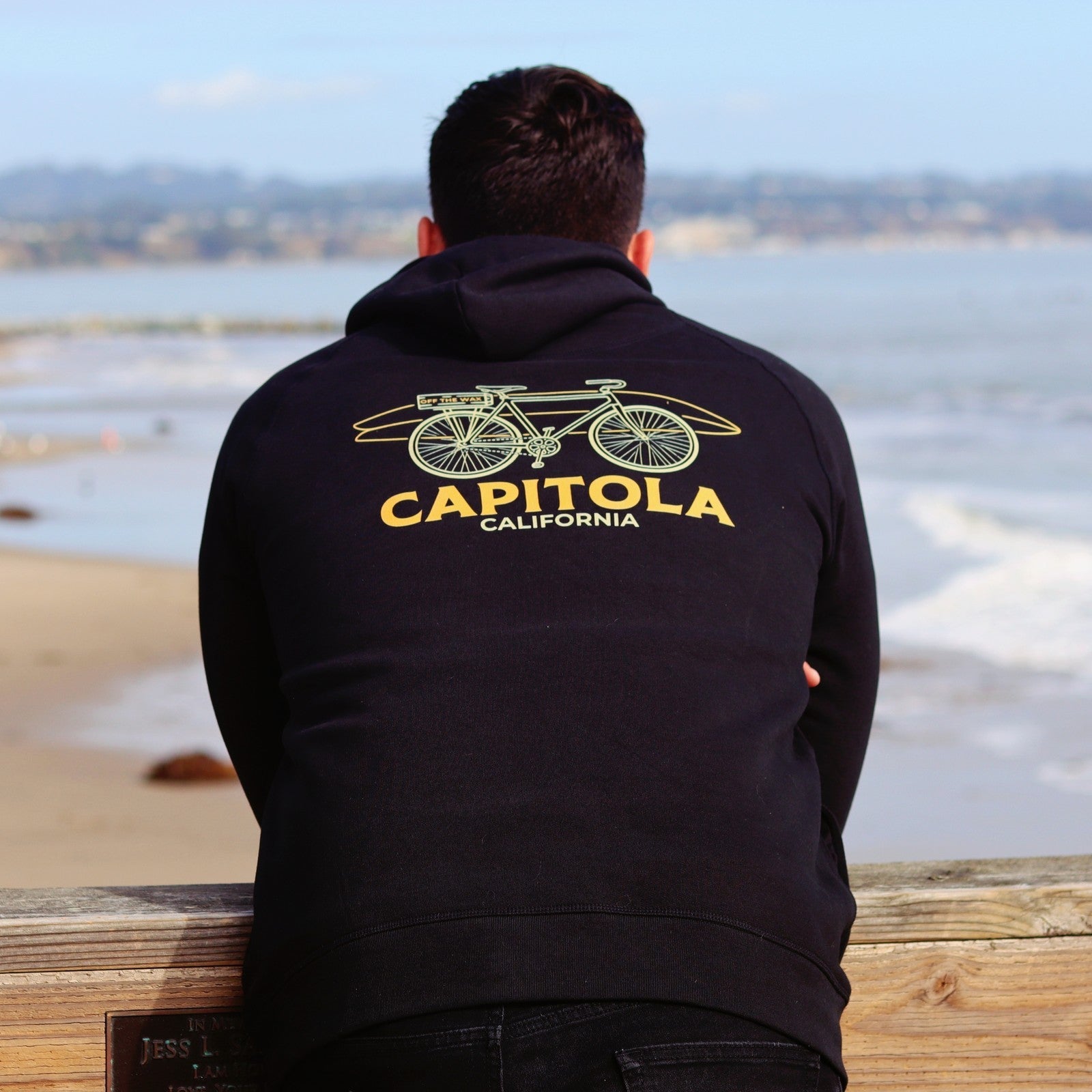 Capitola Bike hoodie on the beach at Capitola