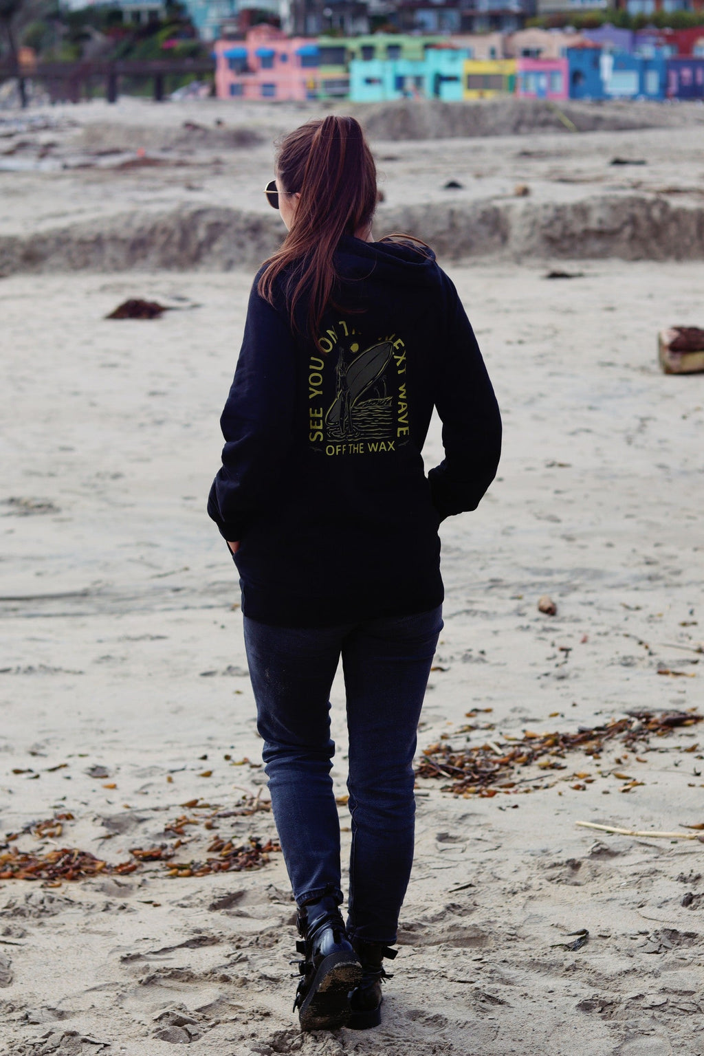 Next Wave hoodie walking the beach at Capitola