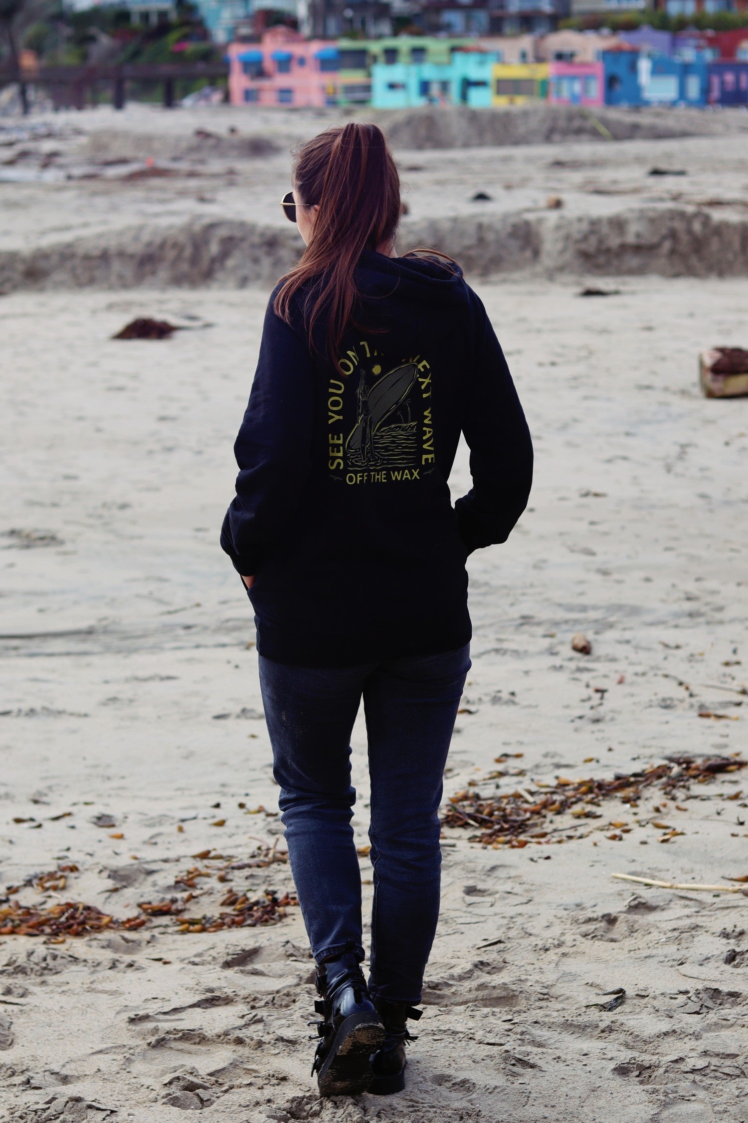 Next Wave hoodie walking the beach at Capitola
